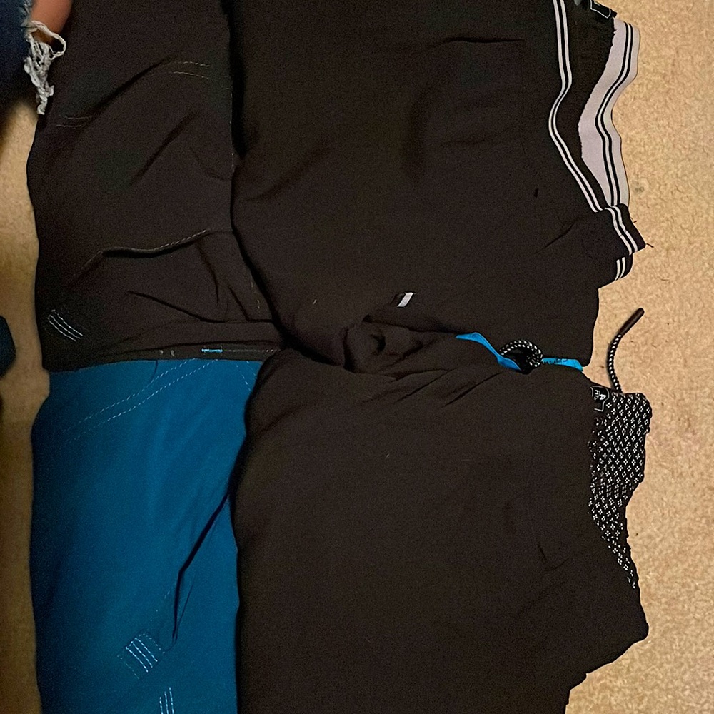 Selling Carhart and beyond soft scrub pants, like new. Three black/one teal